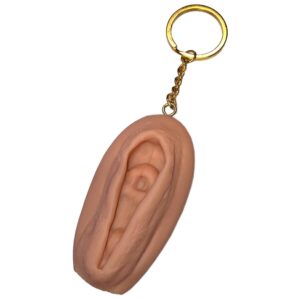 Vaginanyckelring i hudton - rolig och diskret detalj