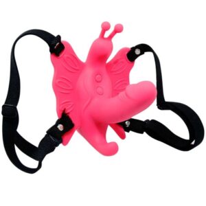 Vibrerande fjärilsharnös med dildo
